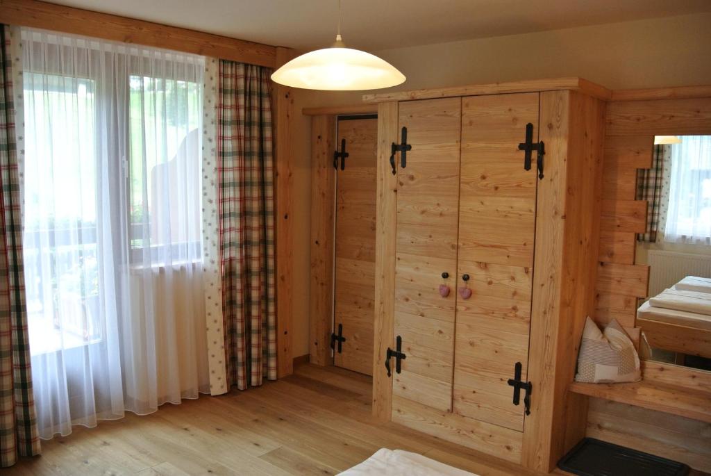 Postel nebo postele na pokoji v ubytování Pension und Apartment Edelweiß