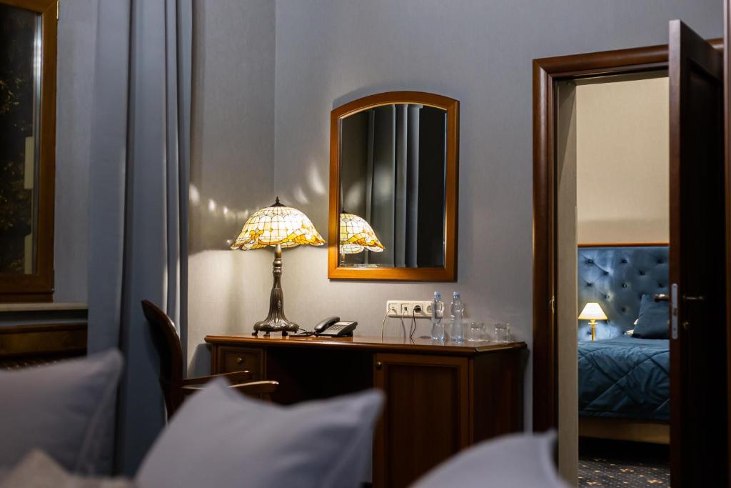 Postel nebo postele na pokoji v ubytování Chopin Hotel