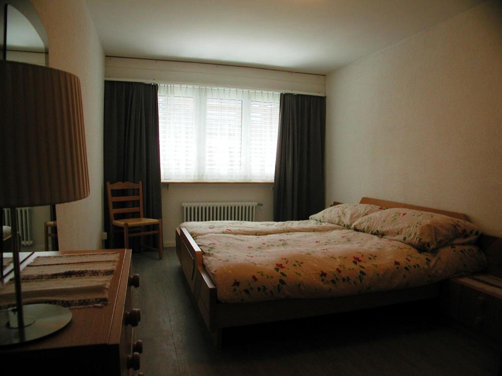 Postel nebo postele na pokoji v ubytování Brunegghorn 4