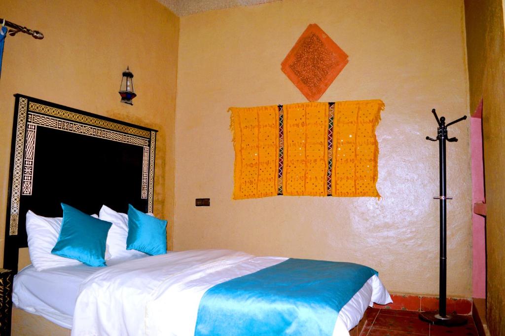 Postel nebo postele na pokoji v ubytování Auberge Les Roches