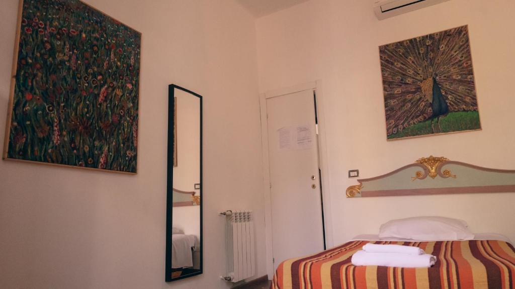 Łóżko lub łóżka w pokoju w obiekcie Casa ParticulART