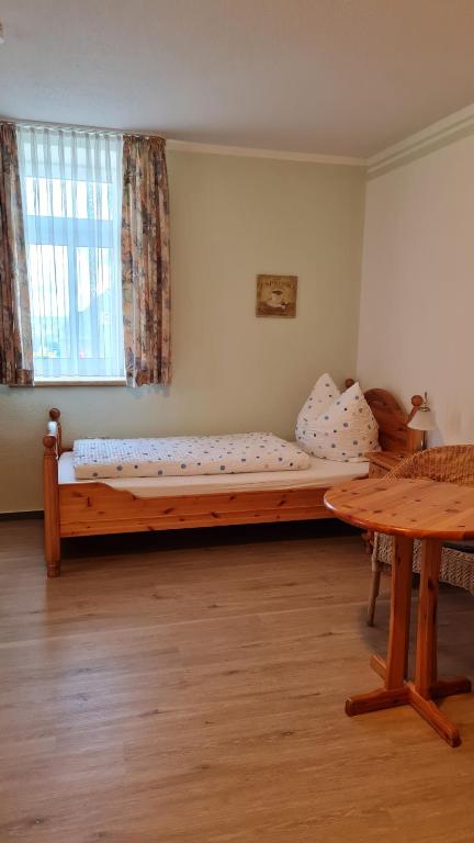 Postel nebo postele na pokoji v ubytování Pension Breitenborn