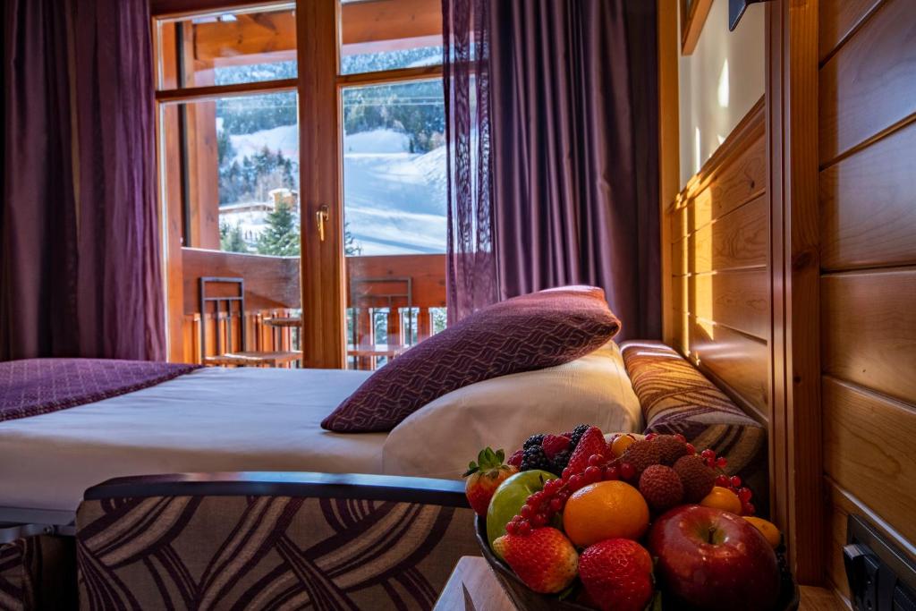 Postel nebo postele na pokoji v ubytování Hotel Nordic