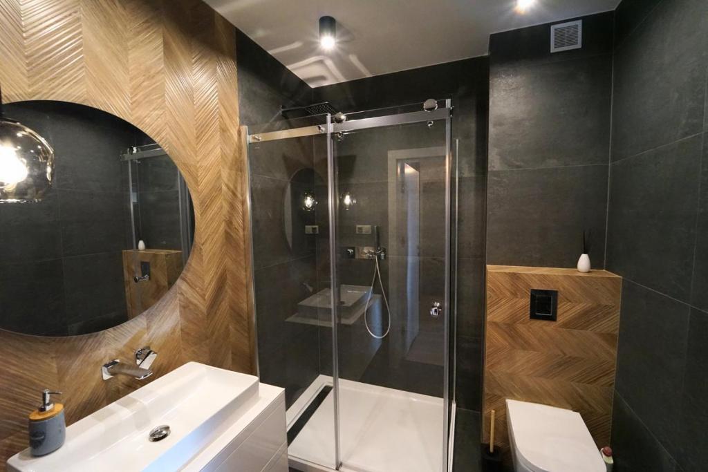 Kúpeľňa v ubytovaní Apartamenty EverySky - Mickiewicza 30