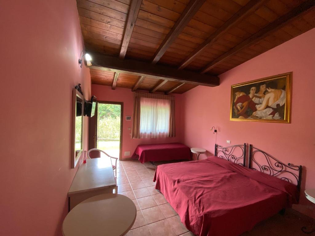 Letto o letti in una camera di Agriturismo Montefosco