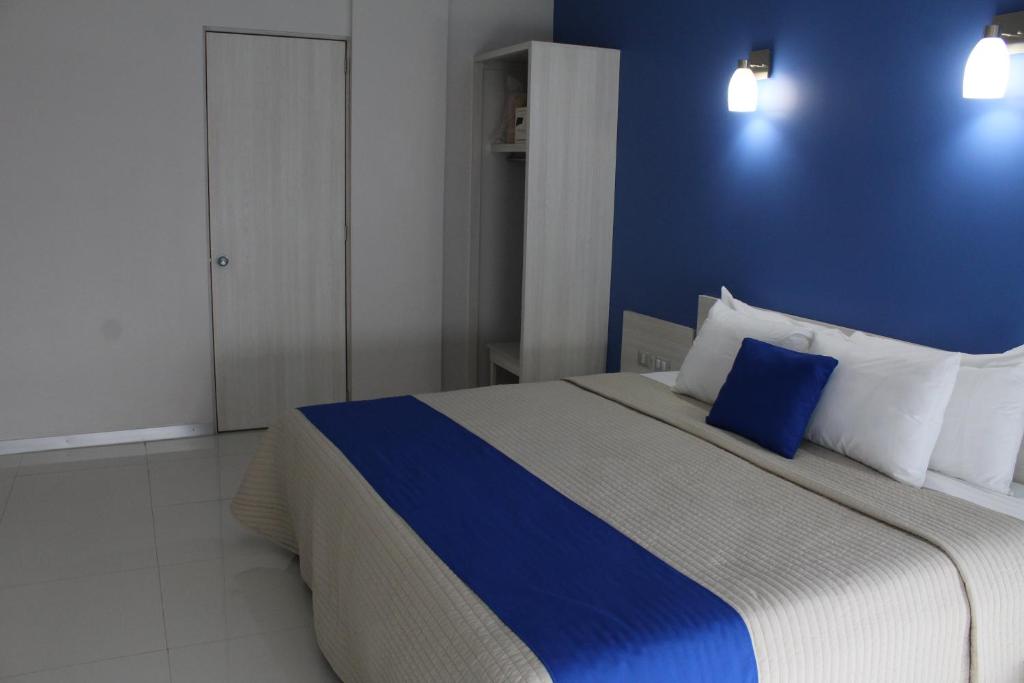 Postel nebo postele na pokoji v ubytování SC HOTEL