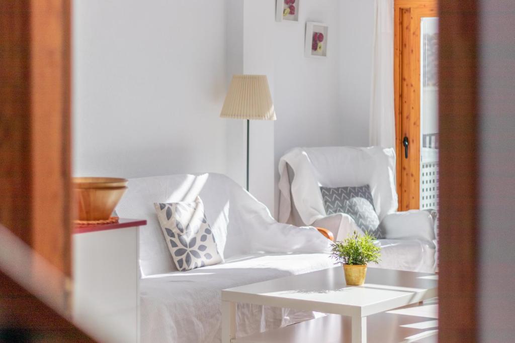 Posteľ alebo postele v izbe v ubytovaní Altea Villa Buraux , Apartamento con vistas al mar & parking en el corazón del casco viejo de Altea