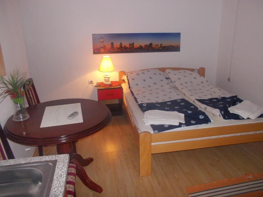 Postel nebo postele na pokoji v ubytování Apartments Agape