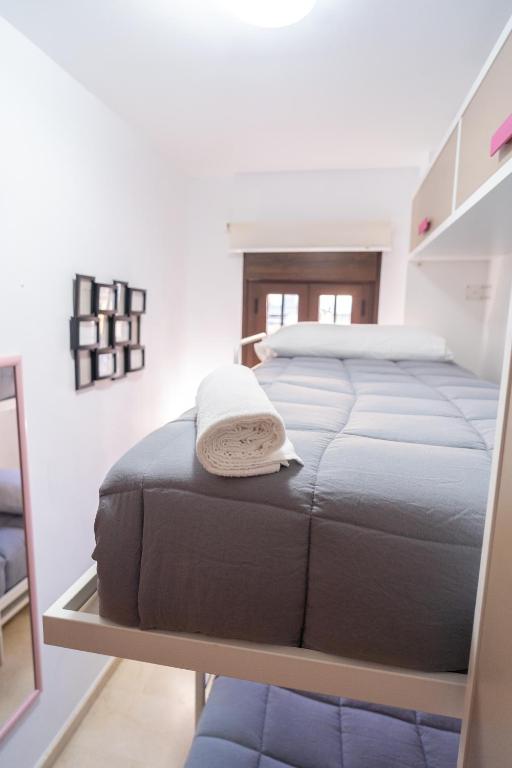 Posteľ alebo postele v izbe v ubytovaní Luxury Ronda Center