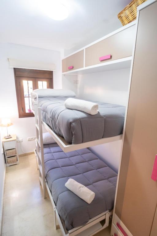 Posteľ alebo postele v izbe v ubytovaní Luxury Ronda Center