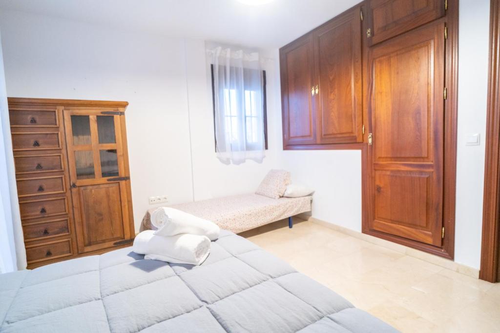 Posteľ alebo postele v izbe v ubytovaní Luxury Ronda Center