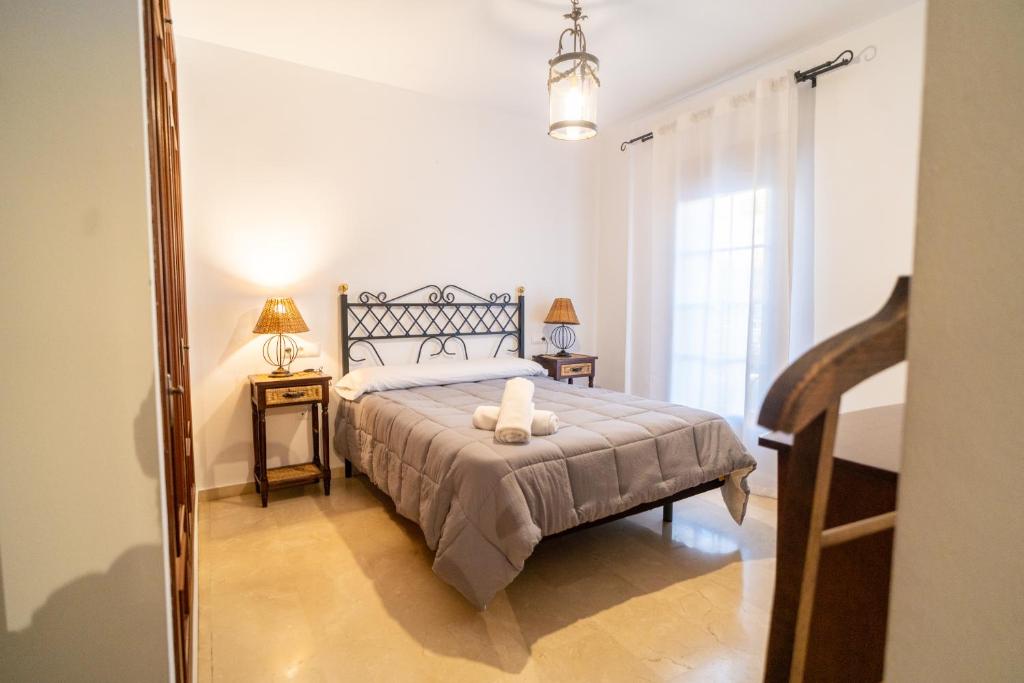 Posteľ alebo postele v izbe v ubytovaní Luxury Ronda Center