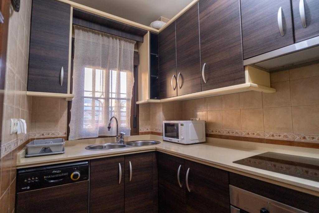Kuchyňa alebo kuchynka v ubytovaní Luxury Ronda Center