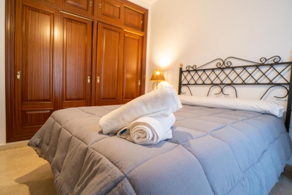 Posteľ alebo postele v izbe v ubytovaní Luxury Ronda Center