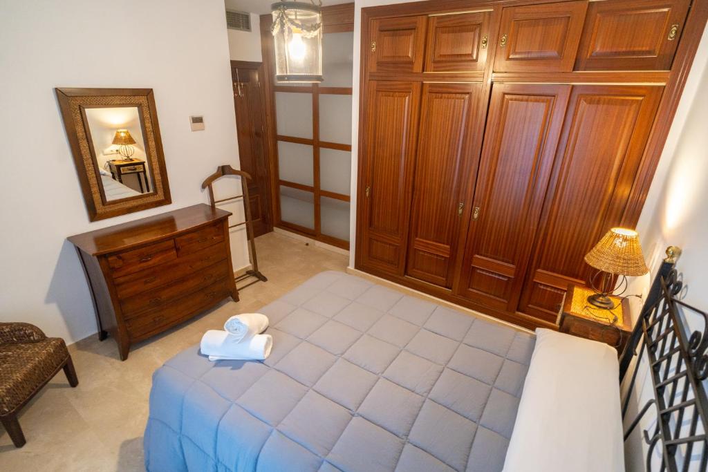 Posteľ alebo postele v izbe v ubytovaní Luxury Ronda Center
