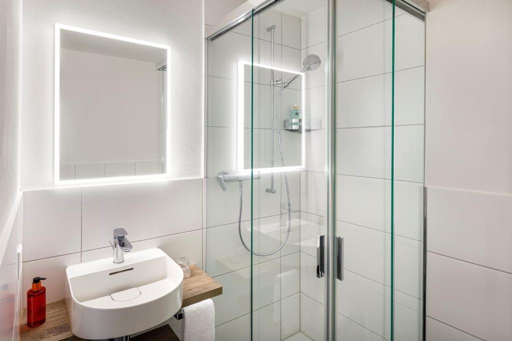 Koupelna v ubytování Hotel Schweizerhof