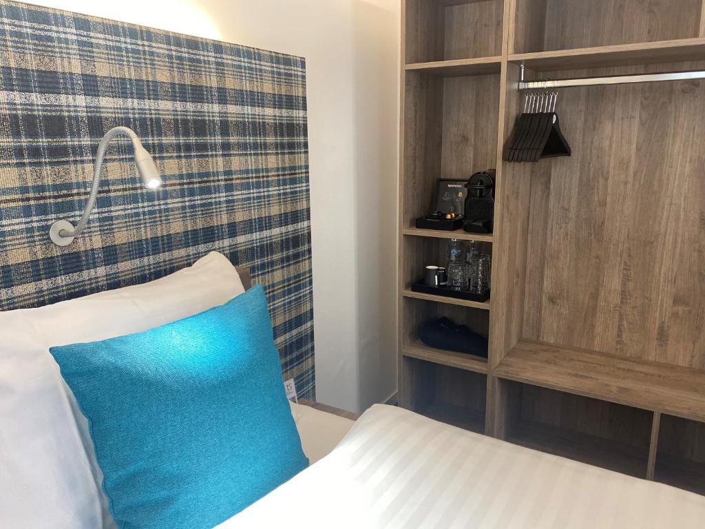 Postel nebo postele na pokoji v ubytování Hotel Schweizerhof