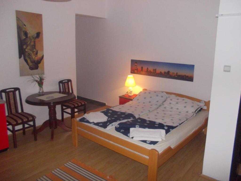 Postel nebo postele na pokoji v ubytování Apartments Agape
