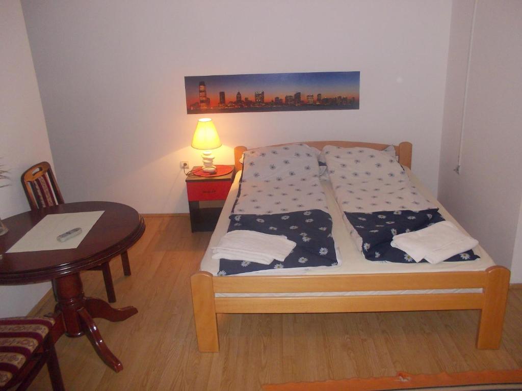 Postel nebo postele na pokoji v ubytování Apartments Agape