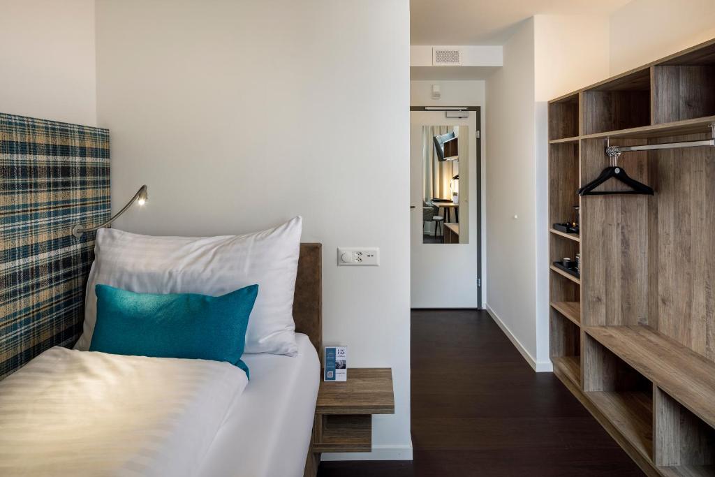 Postel nebo postele na pokoji v ubytování Hotel Schweizerhof