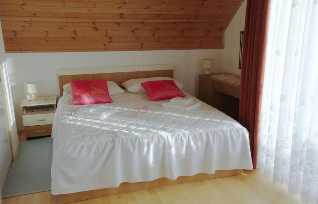 Postel nebo postele na pokoji v ubytování Adriana Guesthouse