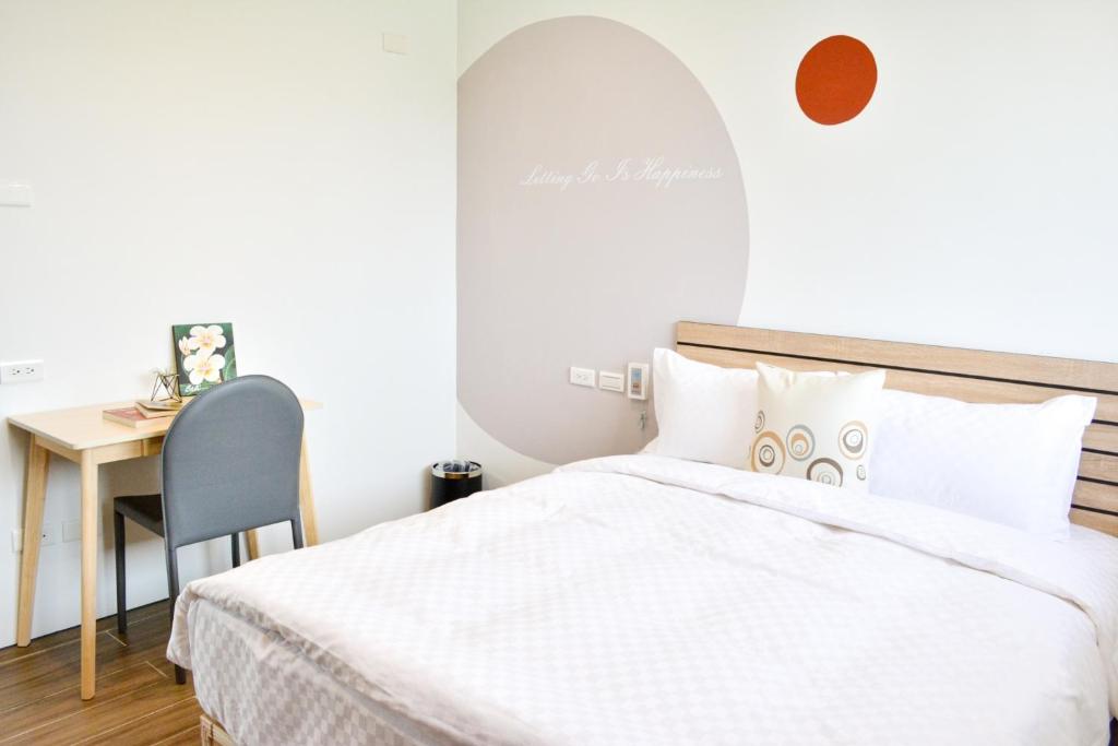 Postel nebo postele na pokoji v ubytování Golden W Hotel