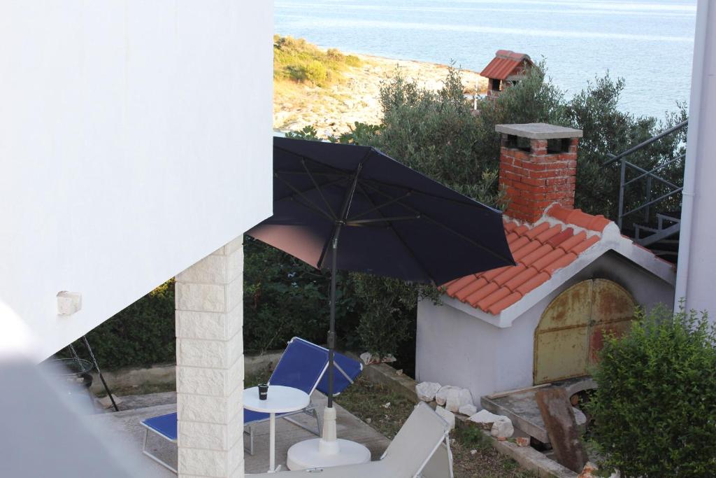 Bazén v ubytování Beach House Paradiso nebo v jeho okolí