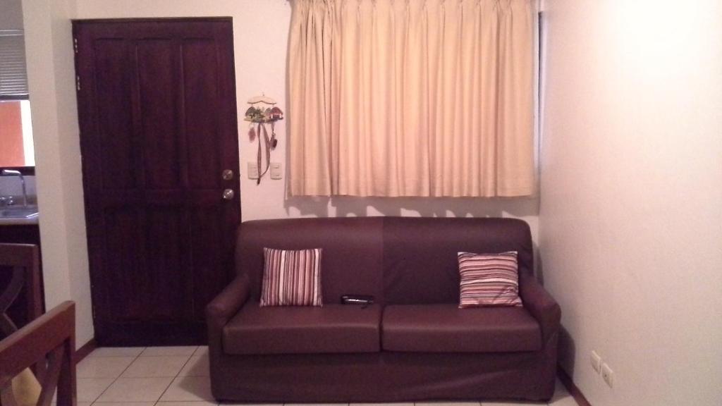 Posezení v ubytování Room in Condo - Nice condo to vacation in Playas del Coco