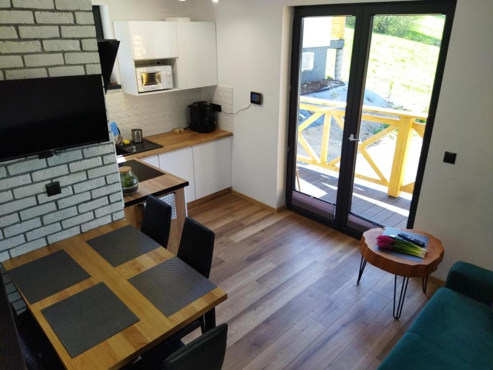 Kuchyň nebo kuchyňský kout v ubytování Chatki wisla houses