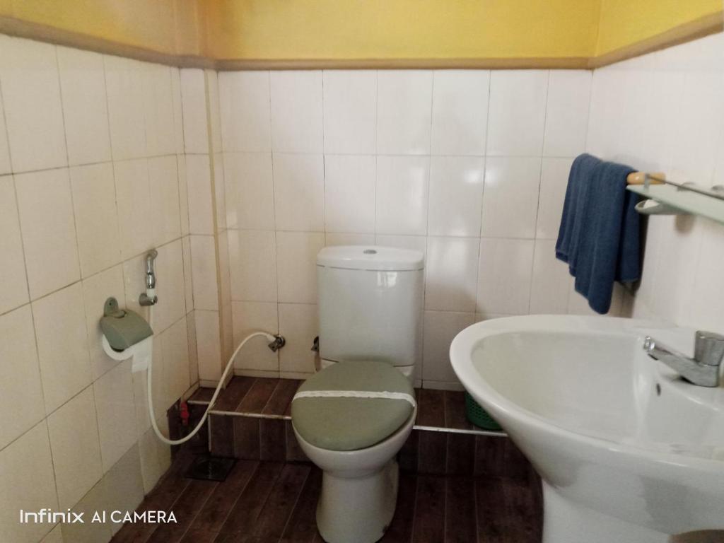 Koupelna v ubytování Manidi Villa
