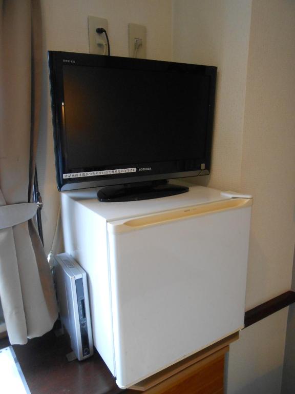 TV a/nebo společenská místnost v ubytování Kakegawa Station Hotel