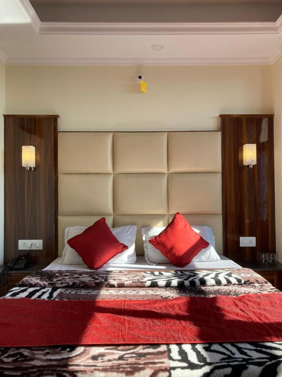 Postel nebo postele na pokoji v ubytování Tanwar B&B (bloominn)