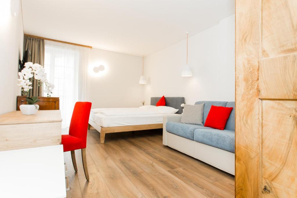 Postel nebo postele na pokoji v ubytování Hotel Elefant