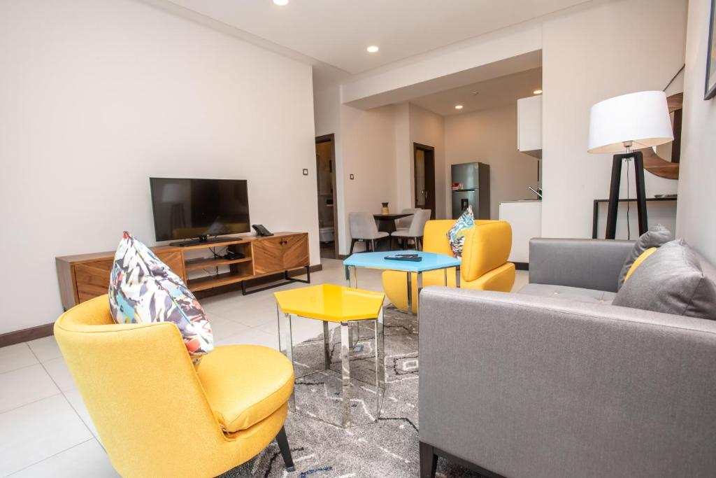 TV a/nebo společenská místnost v ubytování Skynest Residences by CityBlue, Nairobi - Official