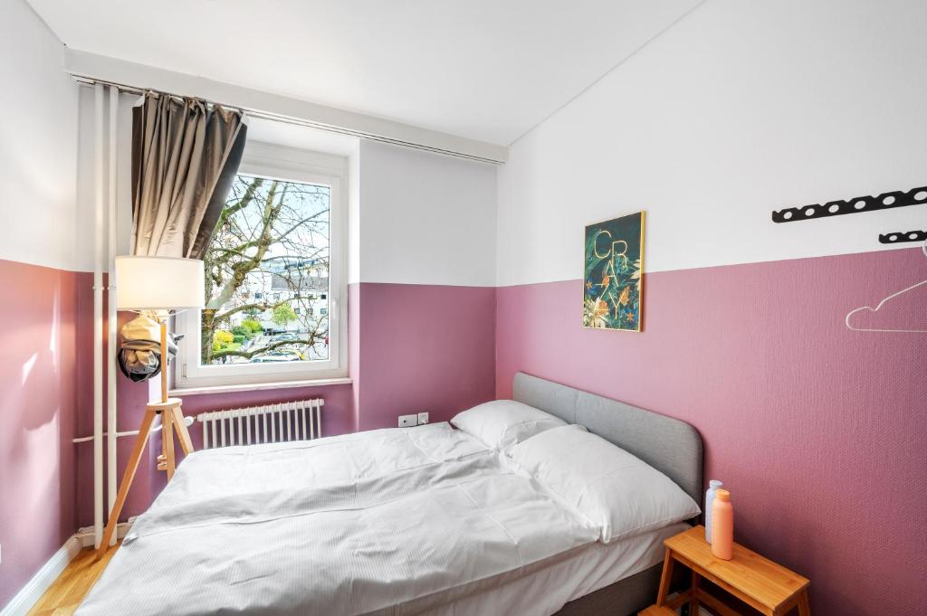 Letto o letti in una camera di Becozy Self Check-in Pop-Up Hotel Basel