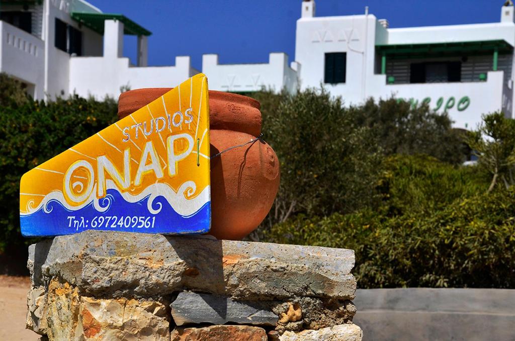 a box of olympics navapa sitting on a wall at Onar Studios in Koufonisia