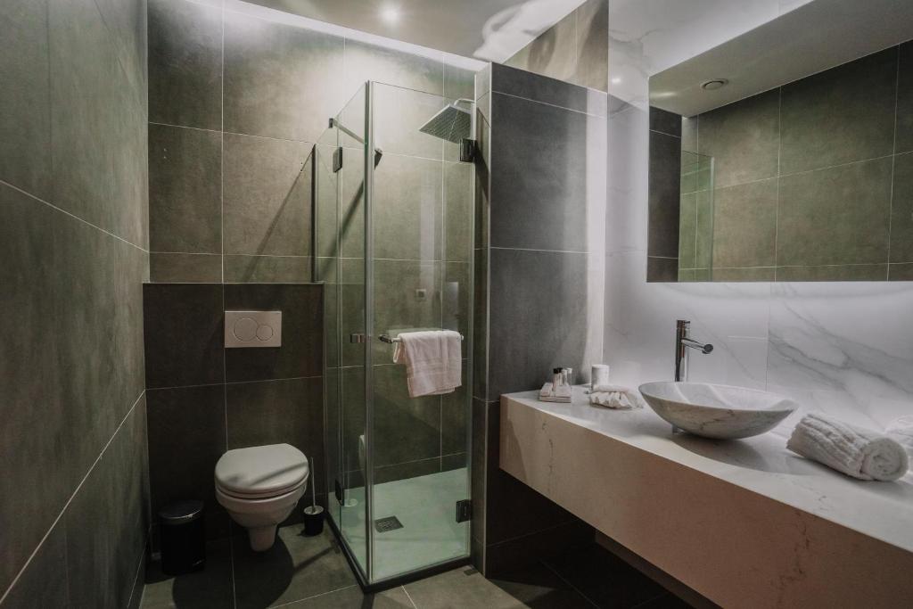 Koupelna v ubytování Hôtel Concorde