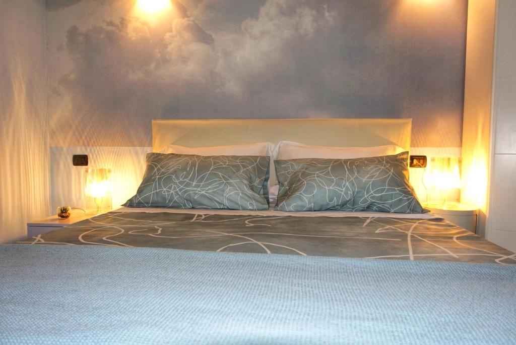 Postel nebo postele na pokoji v ubytování Suite and the City Milan B&B