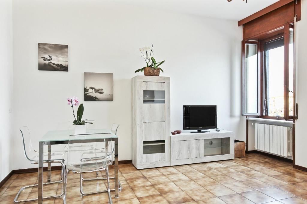 TV a/nebo společenská místnost v ubytování Casa La Rivetta by Halldis