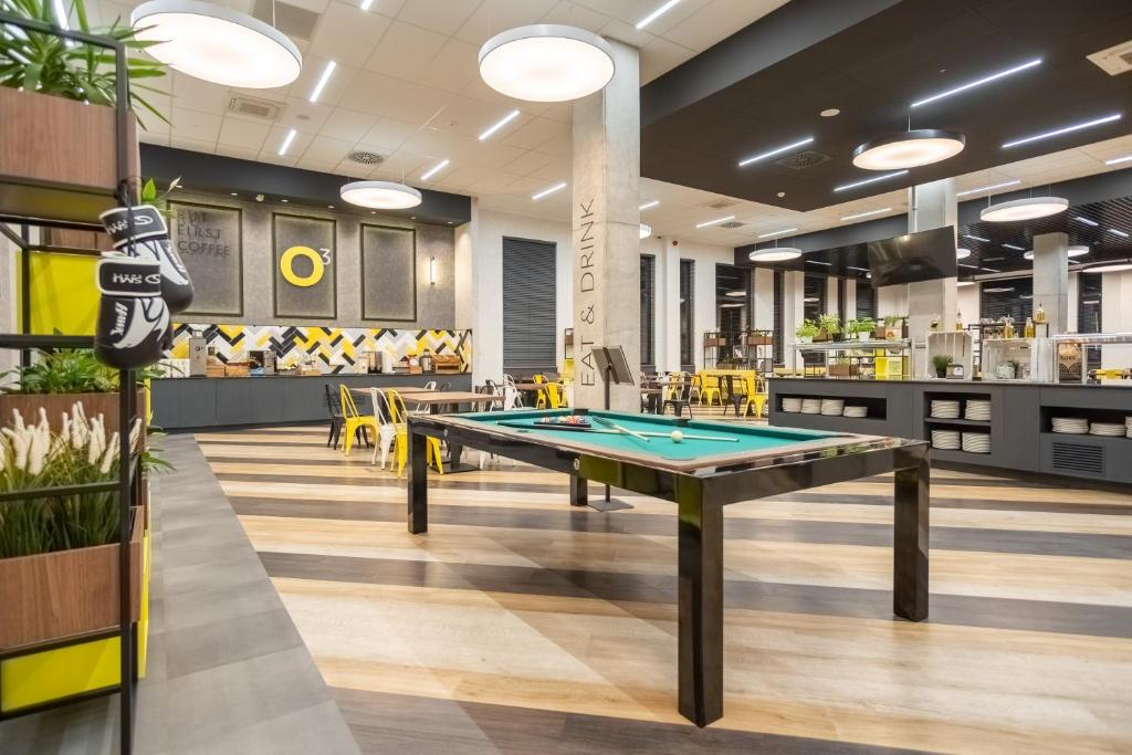 Biliardový stôl v ubytovaní o3Hotel