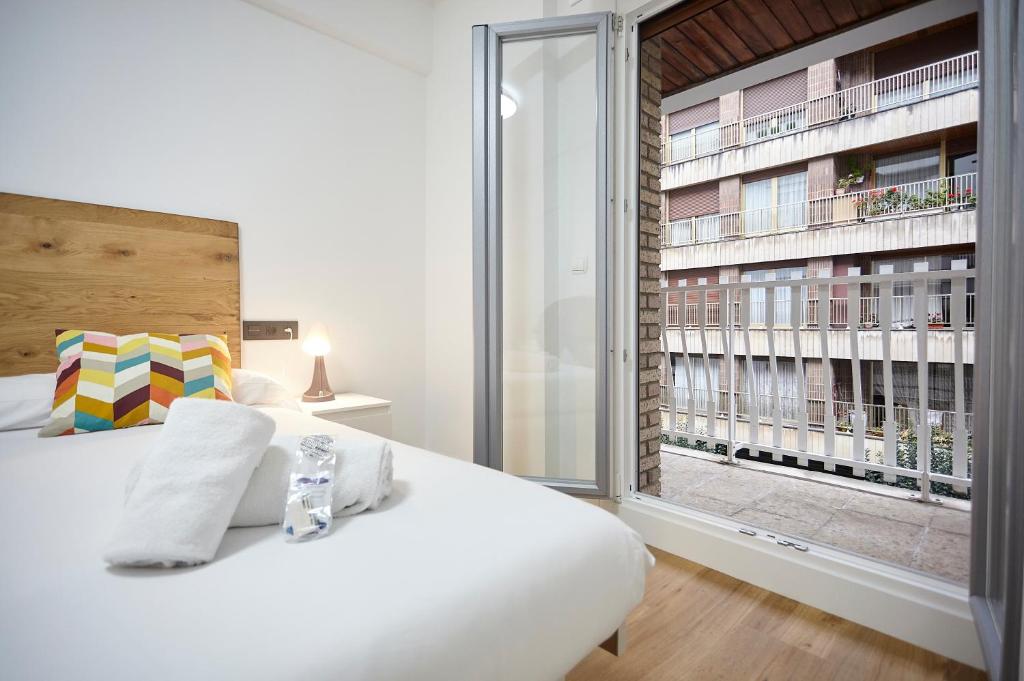 Posteľ alebo postele v izbe v ubytovaní Izpizua Apartment