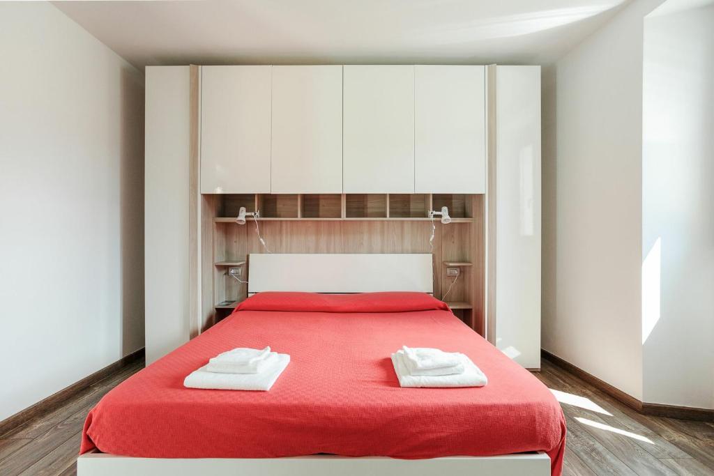 Posteľ alebo postele v izbe v ubytovaní Cremia Suits by Halldis