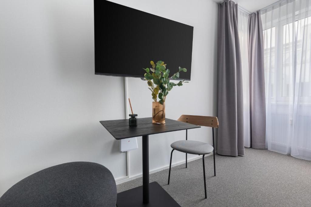 TV a/nebo společenská místnost v ubytování limehome Linz Friedrichstraße
