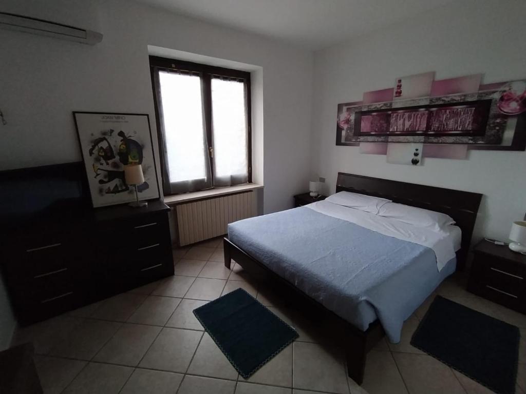 Una cama o camas en una habitación de Casa Privata Villa Roberta