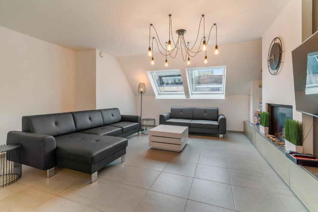 Posezení v ubytování Penthouse Duplex Apartment Statler