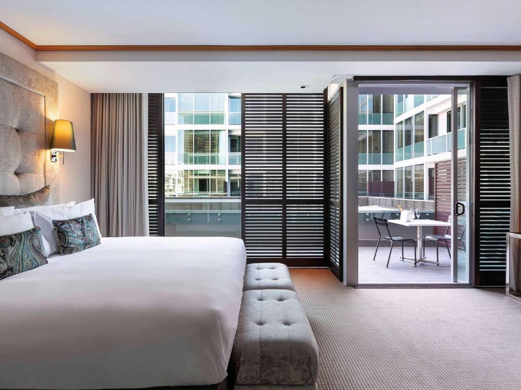 Postel nebo postele na pokoji v ubytování Sofitel Auckland Viaduct Harbour