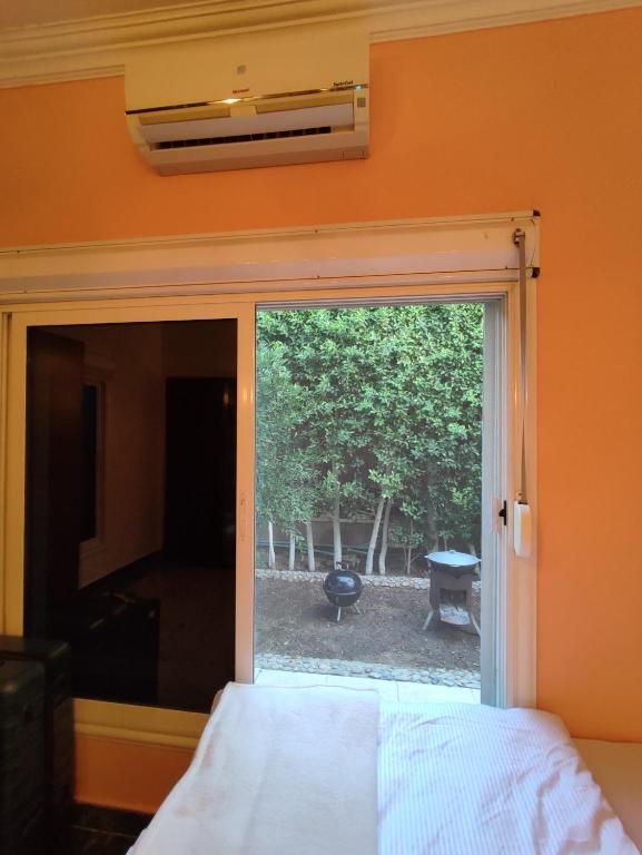 Postel nebo postele na pokoji v ubytování Villa Rayan