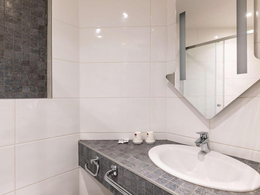 Koupelna v ubytování Ibis Budget Lyon Est Saint Quentin Fallavier