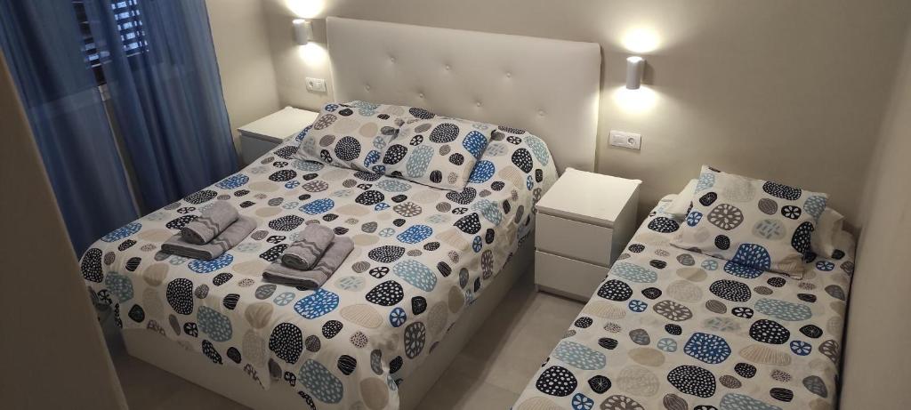 A bed or beds in a room at Relax in Puerto del Carmen