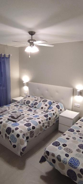 A bed or beds in a room at Relax in Puerto del Carmen